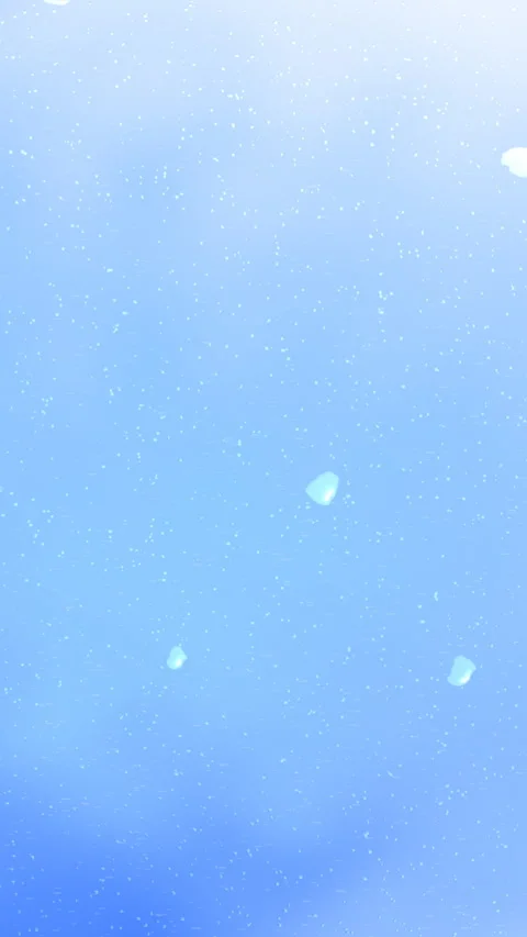 Soft blue gradient with shimmering particles and floating shapes Stockbeeldmateriaal 329254004