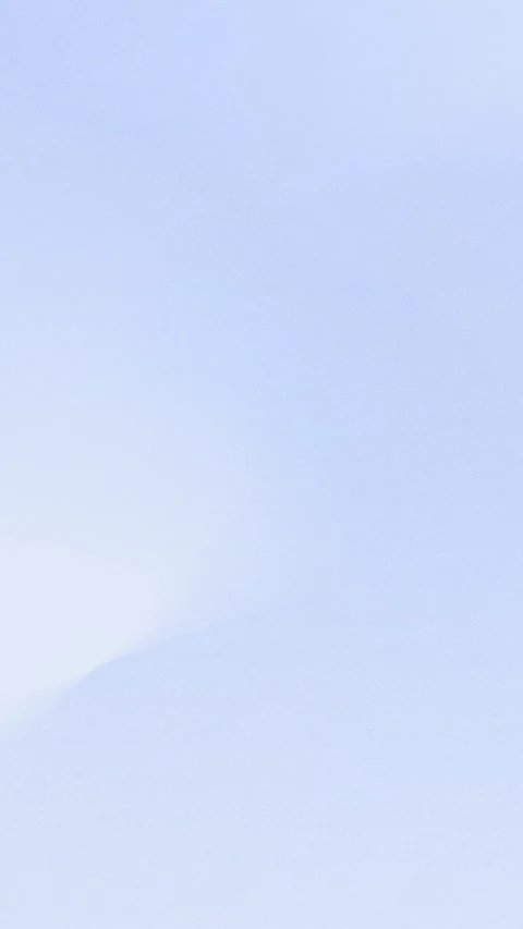 Soft blue gradient with smooth transitions and subtle grain texture. Seamless Stockbeeldmateriaal 309856220