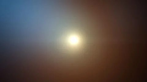 Soft blue light flare glowing on dark background slowly turning into warm gold Stock-Footage 347351304
