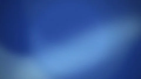 A soft blue light leak drifts in a seamless loop Stock Footage 341855632