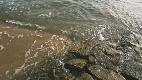 Soft blue ocean wave on sandy beach  Stock Footage 128530254