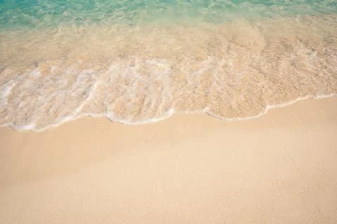 Soft Blue Ocean Wave On Sandy Beach Stock Photos