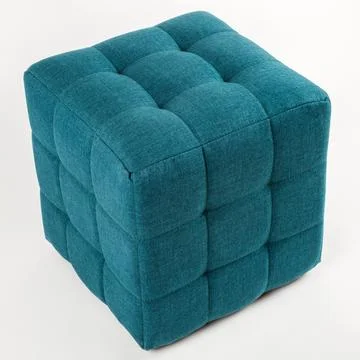 Soft blue pouf on a white background. Stock Photos