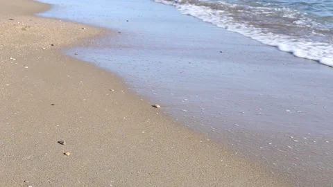 Soft blue sea waves breaking on a shore at a sandy tropical beach at summer Stock-Footage 155053530