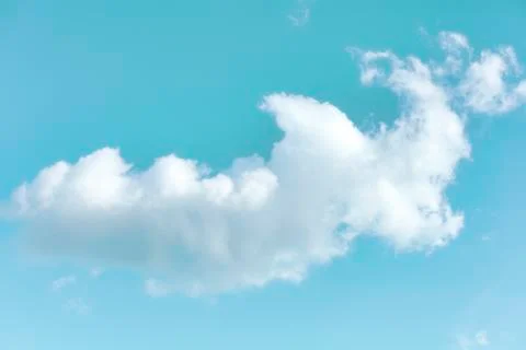 Soft blue sky with cloud background. With copy space for text or design. Stock Photos