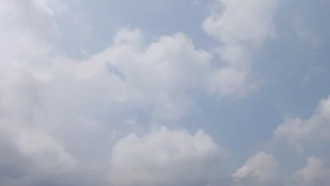 Soft Blue Sky with White Fluffy Clouds Stock Footage 334166838