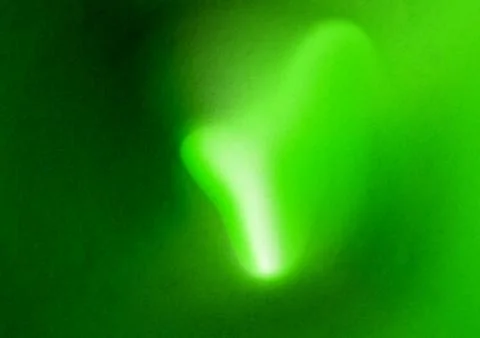 Soft blurred close-up of a green background featuring smooth curves, vibran.. Stockillustratie