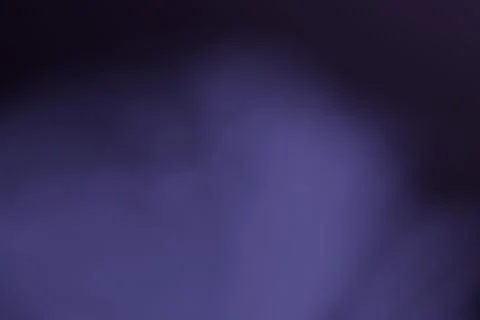 A soft, blurry abstract background gradient. Dark purple-blue tones blend w.. Stock Illustration