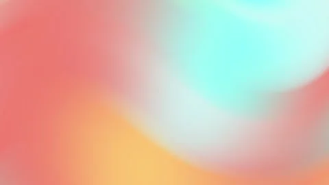 A soft blurry blend of muted reddish-pink orange-yellow and light blue colors Stock Footage 294661678
