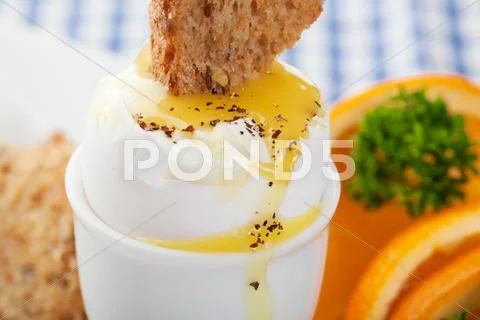 Soft boiled egg and toast Stock Photos