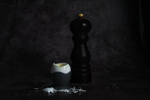 Soft-boiled egg on a stand on a dark background 스톡 사진