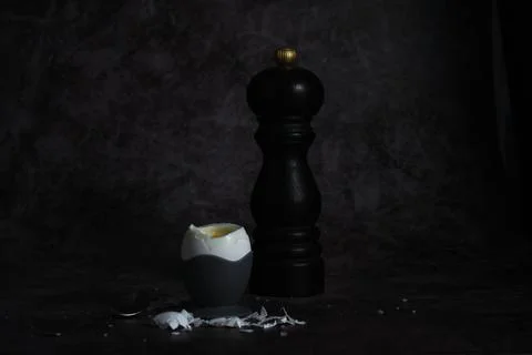 Soft-boiled egg on a stand on a dark background 스톡 사진