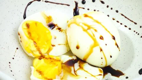 Soft-Boiled Egg on White Background Foto stock