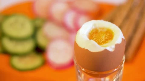 Soft Boiled Egg with Yolk and Healthy Breakfast Ingredients Stock Footage 300819955