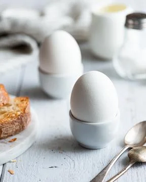 Soft-boiled eggs, breakfast on a white background Stock Photos