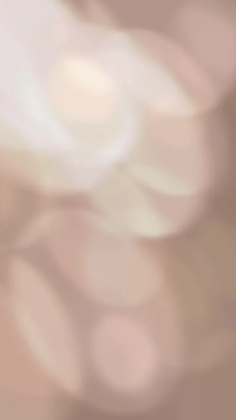 Soft Bokeh Background with Warm Tones and Gentle Light Effects Stock Footage 295324435