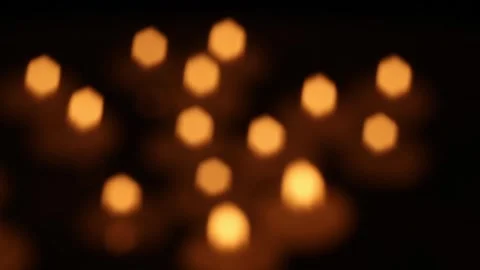 Soft bokeh candle lights shifting in warm ambience Vídeos de archivo 324698233