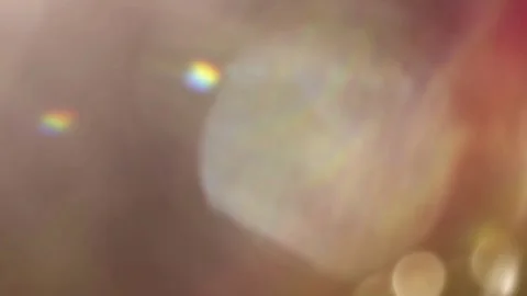 Soft bokeh light background with warm golden glow. Abstract defocused illuminati Stock Footage 334309145