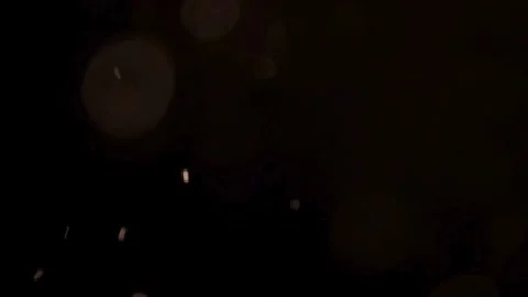 Soft bokeh light circles drift through the air Stock Footage 329598151