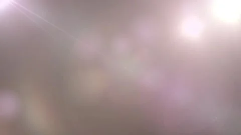 Soft bokeh light flare through circular lens reflection in abstract video Видео 347182350