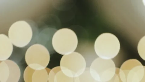 Soft bokeh lights beautifully create a warm and festive ambiance. Texture Stock Footage 308397593