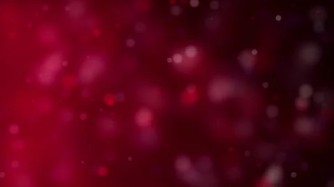 Soft bokeh lights glow and shimmer against a dark red gradient background Stock Footage 344240726