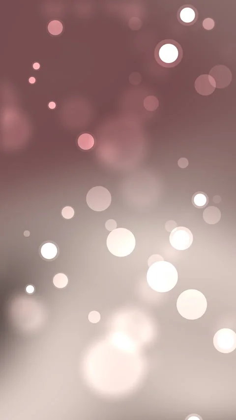 Soft bokeh lights glowing on pinkish gradient background Video stock 336643482