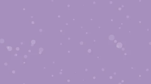 Soft bokeh particles gently drift on purple background, resembling falling snow. Stock Footage 322508272