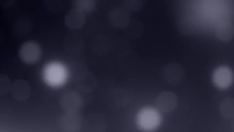 Soft Bokeh White Particles Floating on a Dark Background Stock Footage 305580871