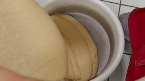 Soft Bread Dough Poured Into Proofing Bucket Stock Footage 340933254