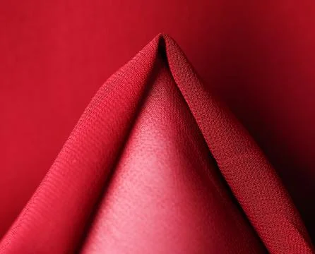 Soft bright ruby textile material textured background Stockfoto's