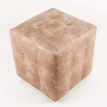 Soft brown pouf on a white background. Stock Photos