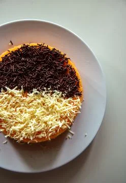 A soft cake with topping Stock Photos