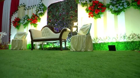 Soft camera movement of bride and groom chairs at indoor wedding 库存影片 224464505
