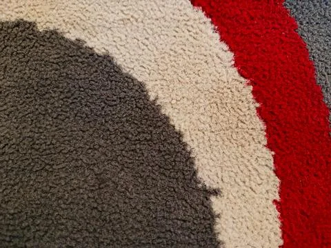 Soft Carpet Texture Background with Abstract Pattern Red Beige and Gray Rug Fotos de archivo