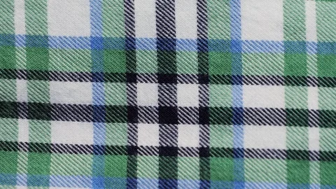 Soft checkered print cotton. The concept of design, natural fabrics for Stock Footage 316812156