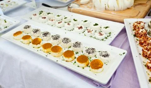 Soft cheese with spices Stock Photos