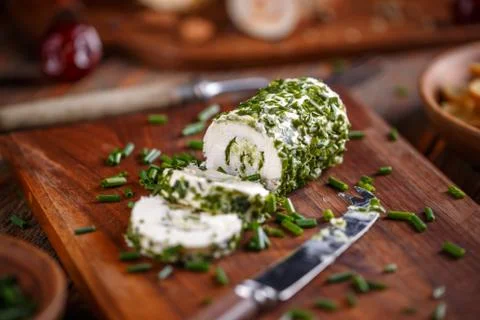 Soft cheeses rolled in chives Stock Photos