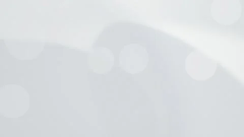 Soft circular bokeh spots drift slowly in a seamless loop Vidéo 343115297