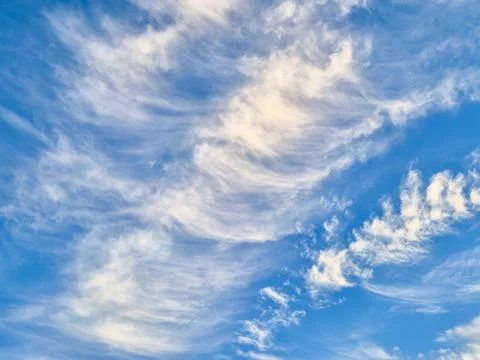 Soft Cirrus Clouds in Blue Sky Stock Photos