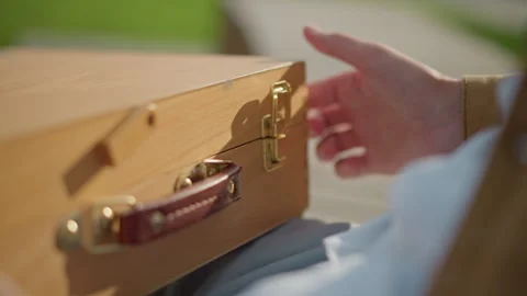 Soft click locks engraved wooden painting instrument container. Calm atmosphere 스톡 동영상 328044846