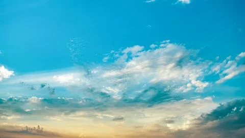 Soft clouds and blue sky with sunlight background Stock Photos