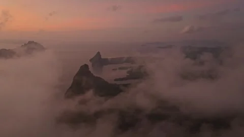 Soft clouds drift above island-studded Phang Nga Bay at dawn, Thailand Stock-Footage 310166585