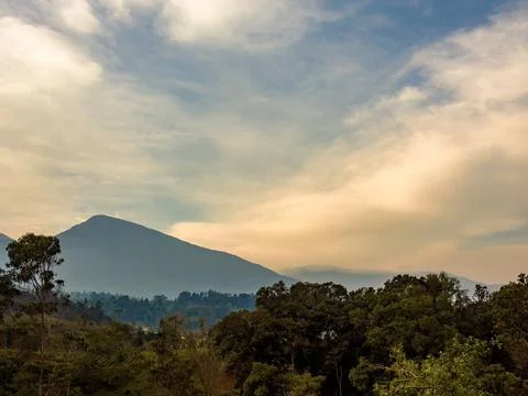 Soft clouds formations float over the Iguaque mountain, in the eastern Andean Stock Photos
