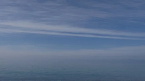 Soft clouds over the seashore Stock Footage 124256483