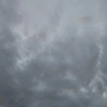 Soft cloudy sky with light rays Stock Photos