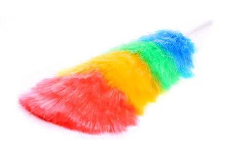 Soft colorful duster with plastic handle close-up Stock Photos