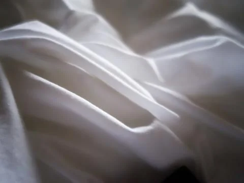 Soft cotton sheets looking comfortable and luxurious Stock Photos