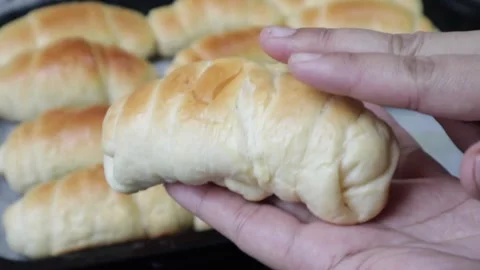 Soft croissant checking  by hands  Stock Footage 158232206