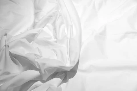 Soft crumpled white bed sheet fabric background photo texture Stock Photos